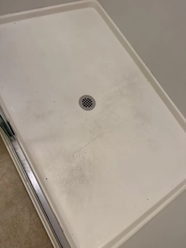 Shower floor before cleaning